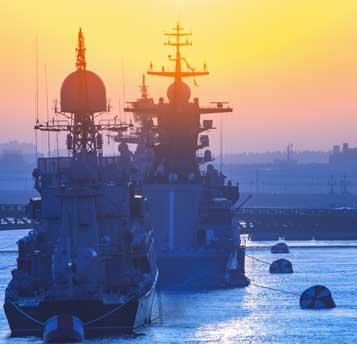 US navy ships in a bay