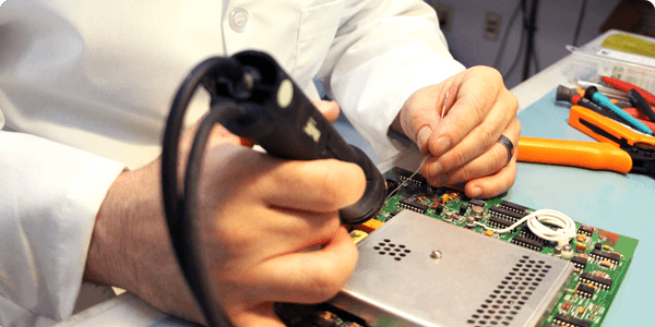 technician reparing a instrument